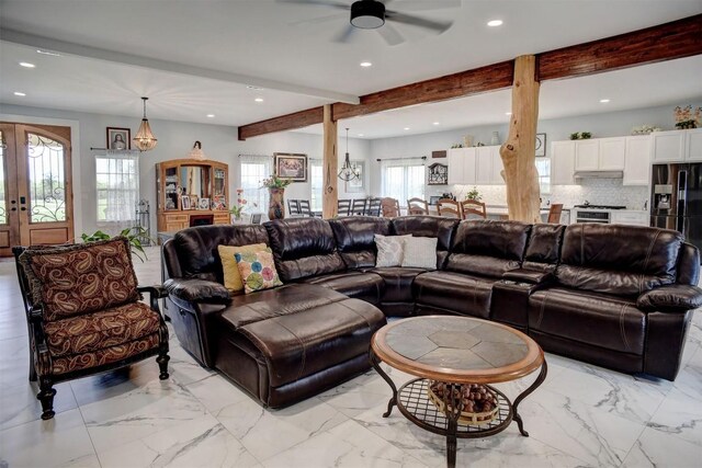 626 Sparta Field Rd, Waelder, TX 78959 - living room with ceiling fan, beam ceiling, recessed lighting, light marble finish floors, and french doors