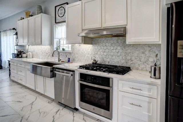 626 Sparta Field Rd, Waelder, TX 78959 - kitchen featuring black appliances, under cabinet range hood, white cabinets, and light stone countertops