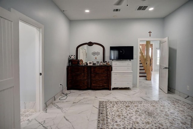 626 Sparta Field Rd, Waelder, TX 78959 - bedroom with marble finish floors and recessed lighting