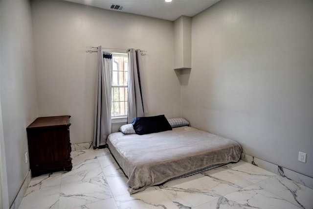 626 Sparta Field Rd, Waelder, TX 78959 - bedroom with light marble finish floors