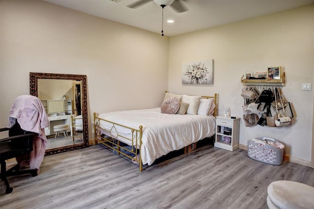 626 Sparta Field Rd, Waelder, TX 78959 - bedroom with wood finished floors, recessed lighting, and a ceiling fan