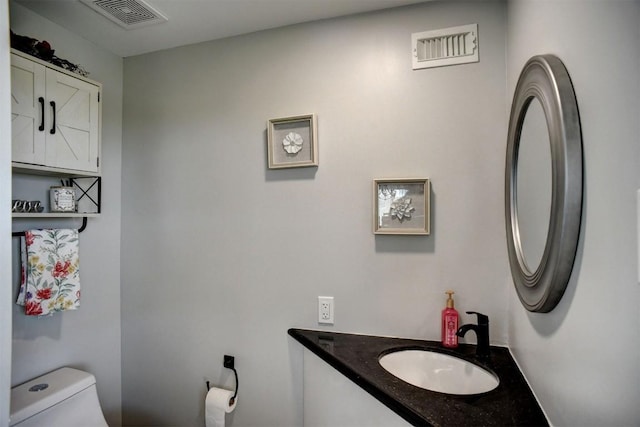 626 Sparta Field Rd, Waelder, TX 78959 - bathroom featuring toilet and vanity
