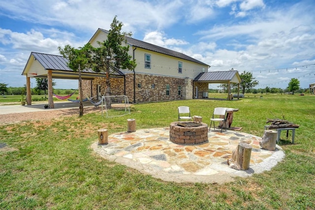 626 Sparta Field Rd, Waelder, TX 78959 - view of patio / terrace with an outdoor fire pit and a gazebo
