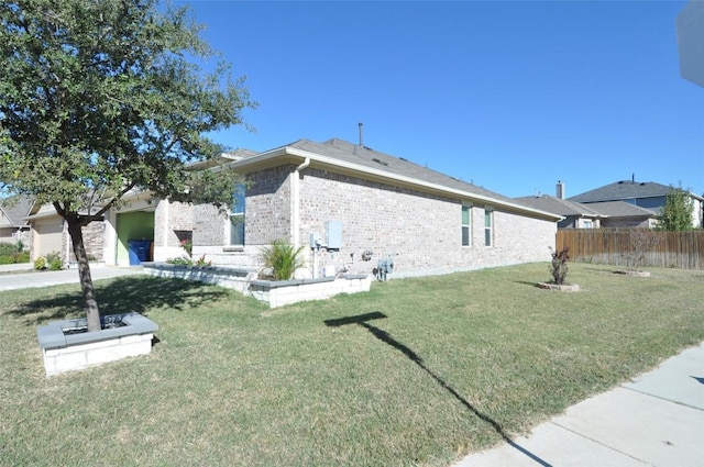 11024 Night Camp Dr, Austin, TX 78754 - view of home's exterior with brick siding and a garage