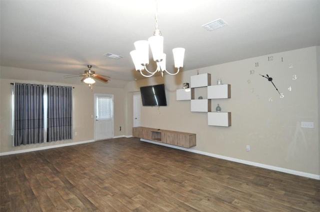 11024 Night Camp Dr, Austin, TX 78754 - unfurnished living room featuring wood finished floors, baseboards, a chandelier, and ceiling fan