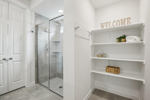 8119 Purple Aster Pass, Leander, TX 78645 - full bathroom featuring a stall shower and tile patterned flooring