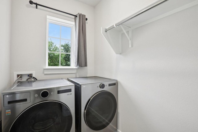 8119 Purple Aster Pass, Leander, TX 78645 - washroom with washer and clothes dryer