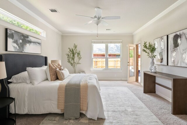 11037 River Plantation Dr, Austin, TX 78747 - bedroom with carpet flooring, ornamental molding, and a ceiling fan