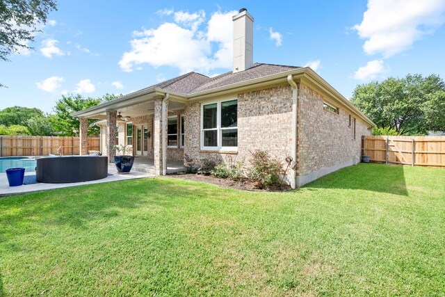 11037 River Plantation Dr, Austin, TX 78747 - rear view of property with a fenced backyard, a patio, a chimney, and a ceiling fan