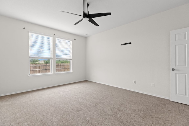 709 Hummingbird Ln, Leander, TX 78641 - carpeted empty room featuring a ceiling fan and baseboards