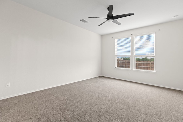 709 Hummingbird Ln, Leander, TX 78641 - carpeted spare room with a ceiling fan and baseboards