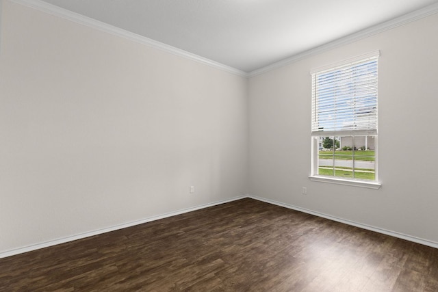 709 Hummingbird Ln, Leander, TX 78641 - unfurnished room featuring dark wood-type flooring, crown molding, and baseboards