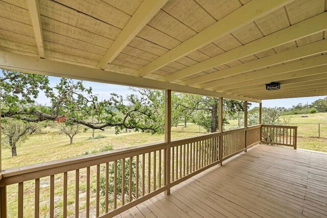 409 Lake View Dr, Spicewood, TX 78669 - deck featuring view of wooded area