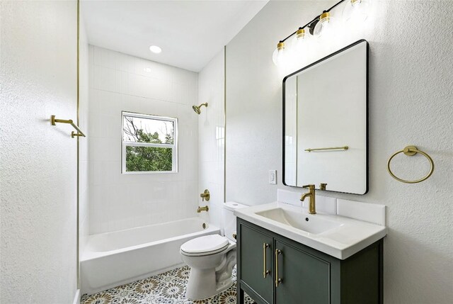 409 Lake View Dr, Spicewood, TX 78669 - full bathroom featuring toilet, vanity, bathing tub / shower combination, and a textured wall