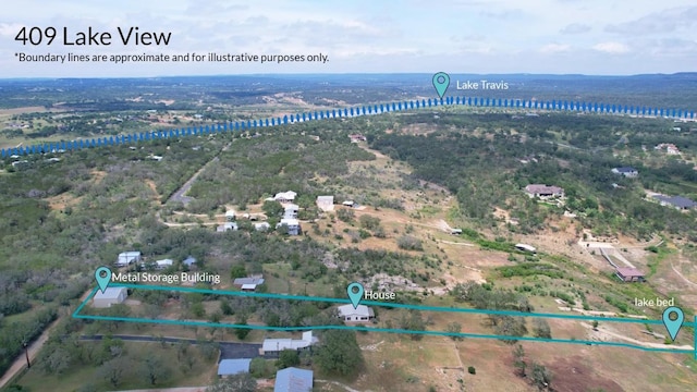 409 Lake View Dr, Spicewood, TX 78669 - aerial view of property and surrounding area featuring property parcel outlined