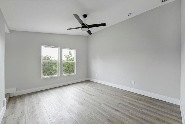 409 Lake View Dr, Spicewood, TX 78669 - unfurnished room featuring wood finished floors, baseboards, and ceiling fan