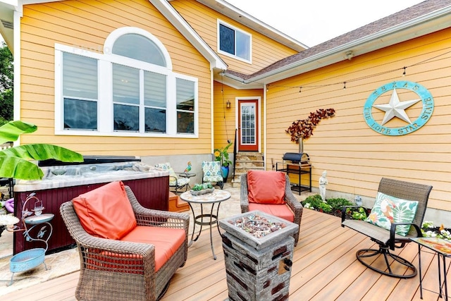 252 Hutton, Kyle, TX 78640 - wooden deck featuring a hot tub, an outdoor fire pit, entry steps, and a grill