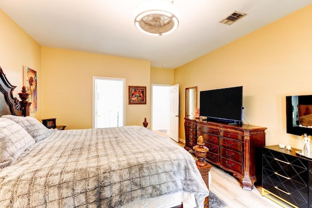 252 Hutton, Kyle, TX 78640 - bedroom featuring wood finished floors