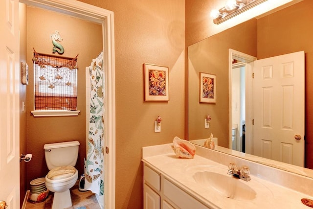 252 Hutton, Kyle, TX 78640 - bathroom featuring vanity, toilet, and a shower with shower curtain