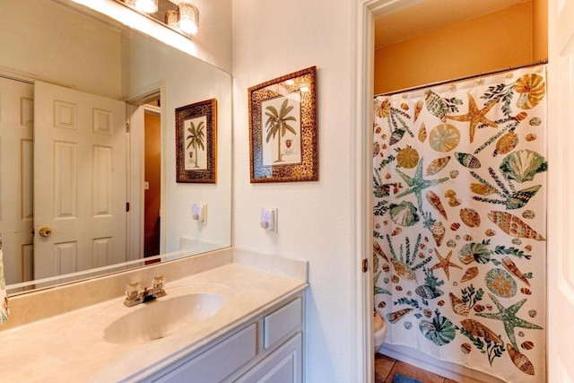 252 Hutton, Kyle, TX 78640 - full bathroom with vanity, toilet, a shower with shower curtain, and tile patterned floors