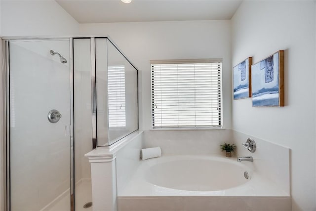 14605 Naruna Way, Pflugerville, TX 78660 - bathroom featuring a stall shower and a garden tub