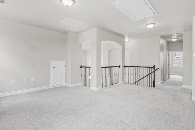 505 Fair Oaks Dr, Georgetown, TX 78628 - spare room featuring attic access, carpet, and baseboards