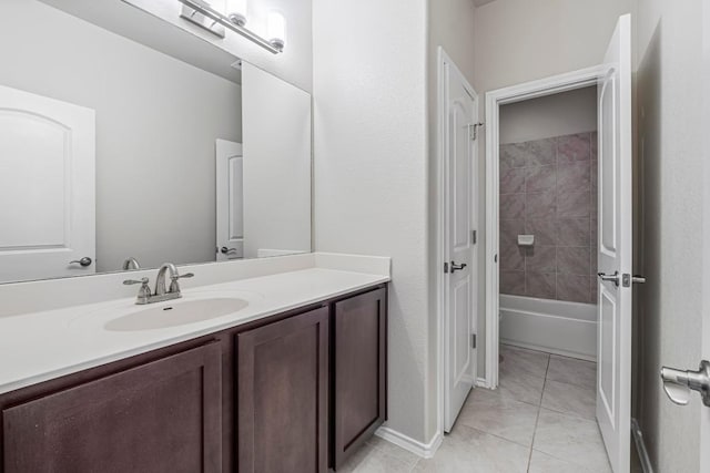 505 Fair Oaks Dr, Georgetown, TX 78628 - bathroom with vanity, tile patterned floors,  shower combination, and baseboards