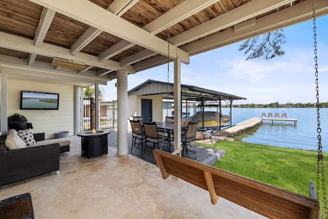 515 Circle Dr, Sunrise Beach, TX 78643 - view of patio featuring a dock and a water view