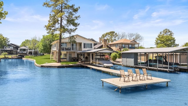 515 Circle Dr, Sunrise Beach, TX 78643 - view of swimming pool with a dock and boat lift