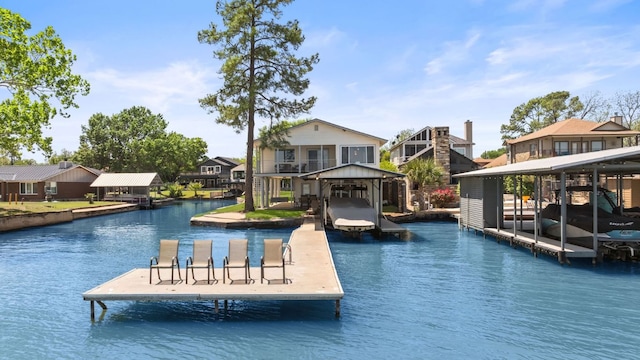 515 Circle Dr, Sunrise Beach, TX 78643 - dock area featuring a water view, a residential view, and boat lift