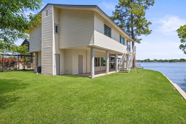 515 Circle Dr, Sunrise Beach, TX 78643 - rear view of property with a patio, a water view, central air condition unit, and stairs