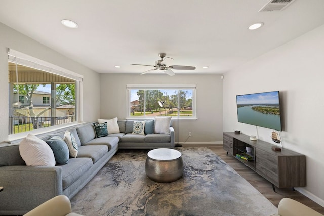 515 Circle Dr, Sunrise Beach, TX 78643 - living room featuring baseboards, wood finished floors, recessed lighting, and ceiling fan