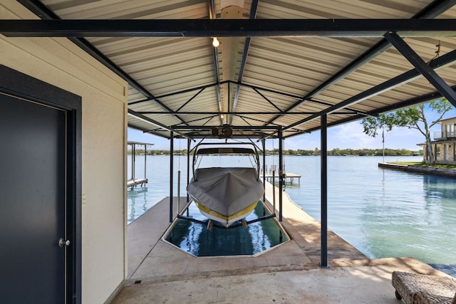 515 Circle Dr, Sunrise Beach, TX 78643 - dock featuring boat lift and a water view
