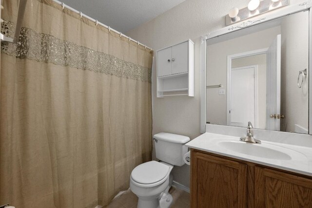 3807 Haleys Way, Round Rock, TX 78665 - full bathroom with toilet, vanity, and a shower with curtain