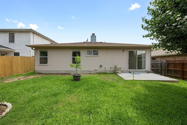 3807 Haleys Way, Round Rock, TX 78665 - back of property with a patio area and a chimney