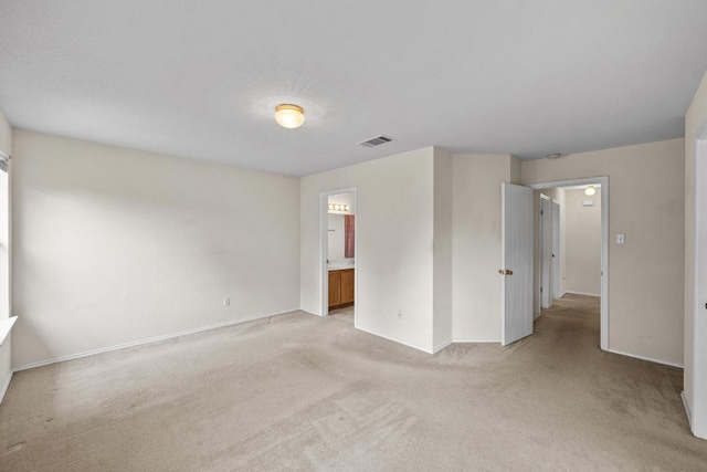 3807 Haleys Way, Round Rock, TX 78665 - unfurnished bedroom featuring light carpet and connected bathroom