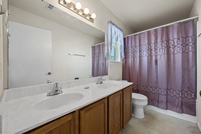 3807 Haleys Way, Round Rock, TX 78665 - bathroom with toilet and double vanity
