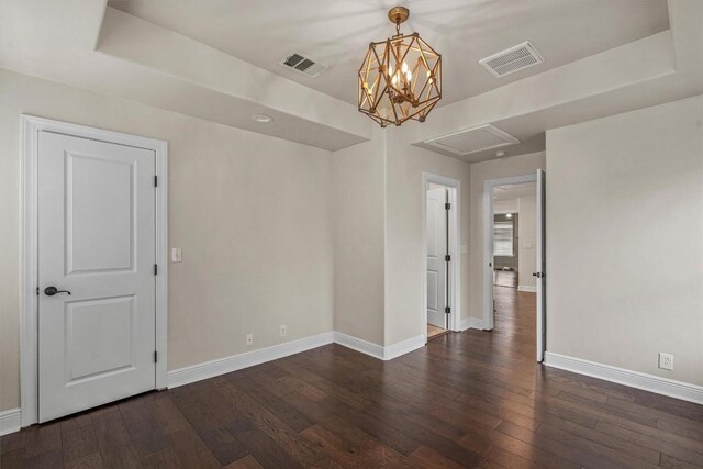 800 Canyon Bend Rd, Pflugerville, TX 78660 - unfurnished room with dark wood-style flooring, baseboards, and attic access