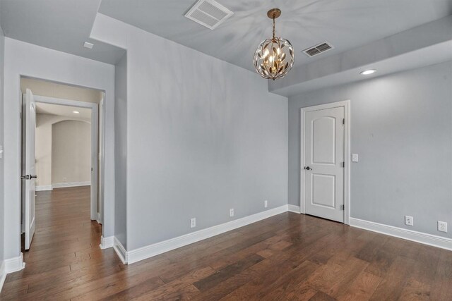 800 Canyon Bend Rd, Pflugerville, TX 78660 - unfurnished room with a chandelier, dark wood-type flooring, baseboards, and recessed lighting