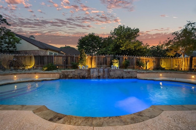 800 Canyon Bend Rd, Pflugerville, TX 78660 - pool at dusk with a fenced backyard