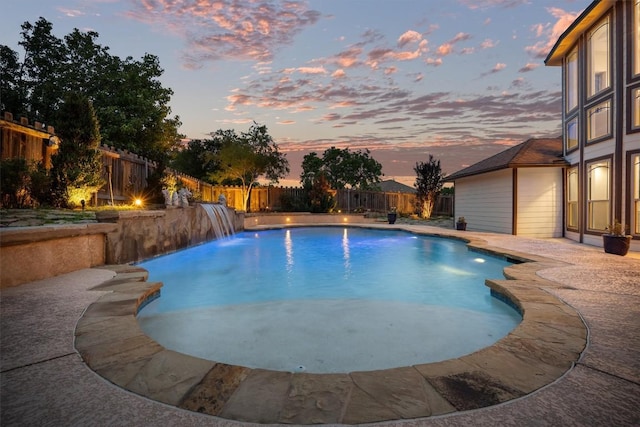 800 Canyon Bend Rd, Pflugerville, TX 78660 - pool at dusk featuring a fenced backyard and a patio area