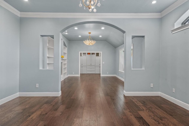 800 Canyon Bend Rd, Pflugerville, TX 78660 - foyer entrance featuring a chandelier, arched walkways, wood finished floors, ornamental molding, and recessed lighting