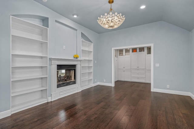 800 Canyon Bend Rd, Pflugerville, TX 78660 - unfurnished living room with a chandelier, wood-type flooring, baseboards, built in shelves, and a multi sided fireplace