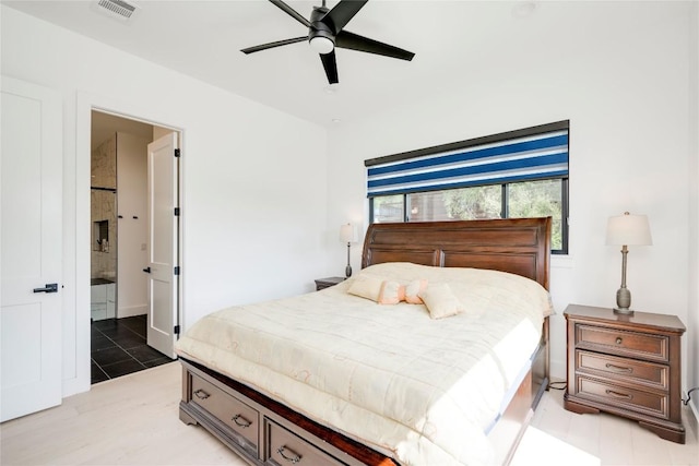 13209 Mansfield Dr, Austin, TX 78732 - bedroom featuring a ceiling fan and connected bathroom