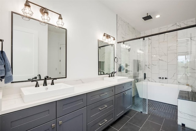 13209 Mansfield Dr, Austin, TX 78732 - full bathroom with a freestanding bath, double vanity, a stall shower, and tile patterned flooring