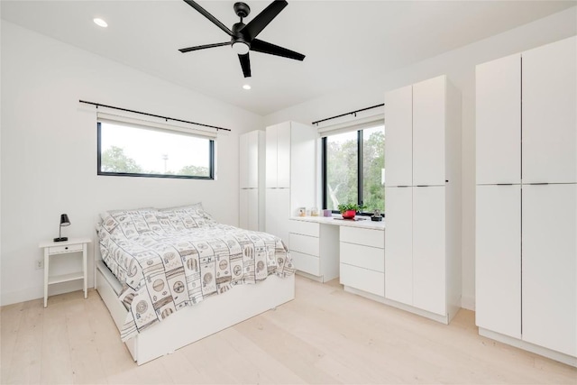 13209 Mansfield Dr, Austin, TX 78732 - bedroom with recessed lighting, light wood-style floors, and a ceiling fan