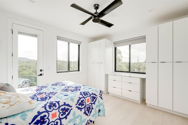 13209 Mansfield Dr, Austin, TX 78732 - bedroom featuring access to outside, light wood finished floors, and ceiling fan