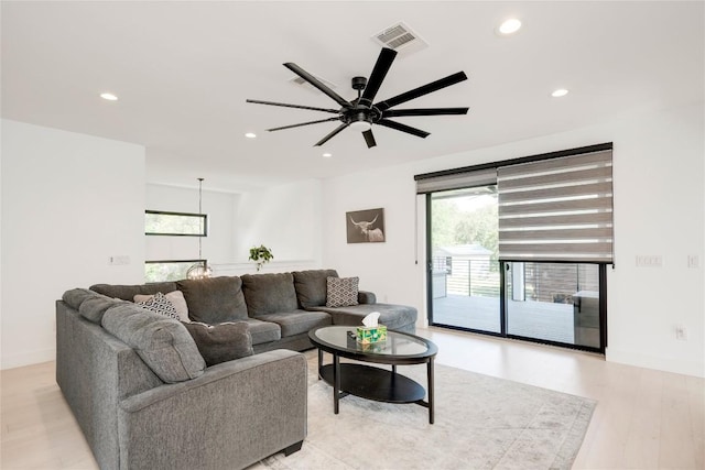 13209 Mansfield Dr, Austin, TX 78732 - living area with recessed lighting, a ceiling fan, and light wood-style flooring