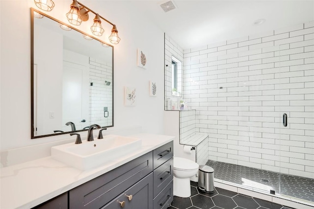 13209 Mansfield Dr, Austin, TX 78732 - bathroom with vanity, a stall shower, and tile patterned floors