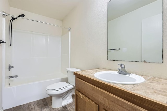 224 Copper Ln, Jarrell, TX 76537 - full bathroom with wood finished floors, toilet, vanity, and bathtub / shower combination